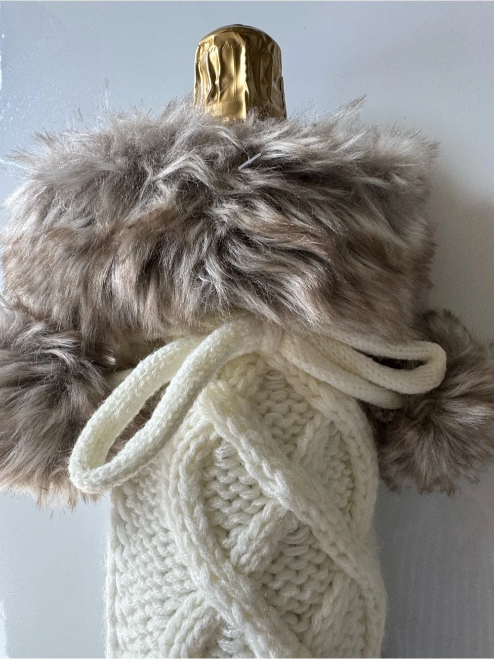 UGG Cream Cable Knit Bottle Sleeve with Faux Fur Pom Poms
